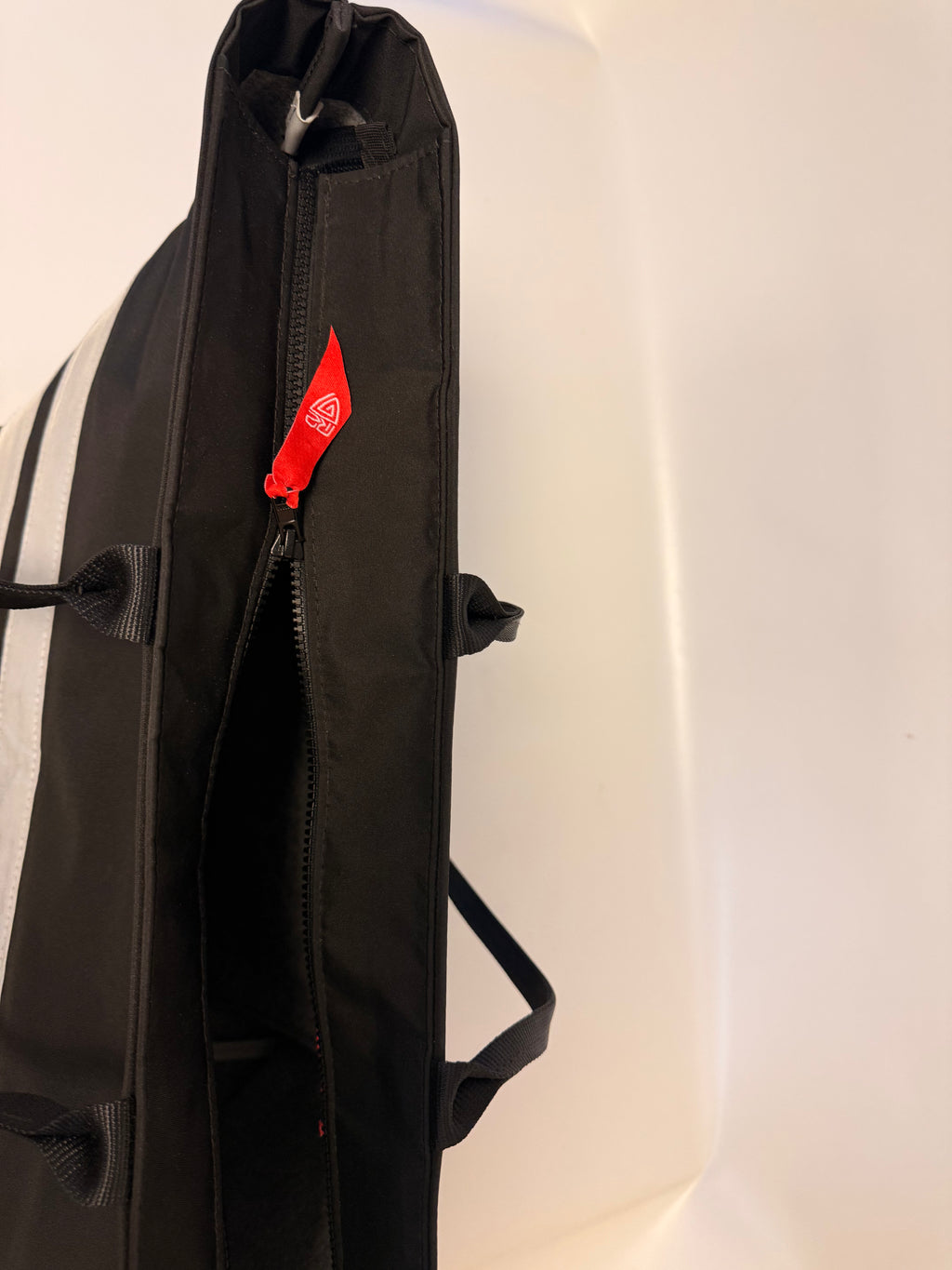 Weekend bag with closingtop and reflex panels